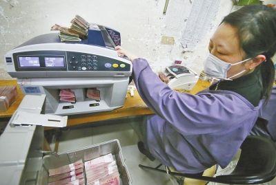 洛阳一企业用残损纸币发电 1吨可发电660度(图)